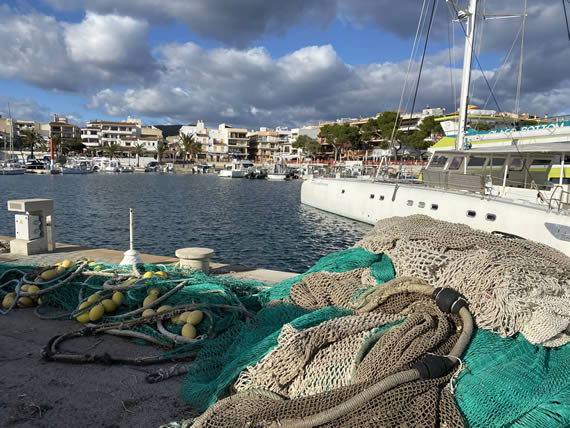 cala ratjada harbour with fisherman nets